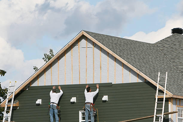 Professional Siding technician working in Williamstown, PA